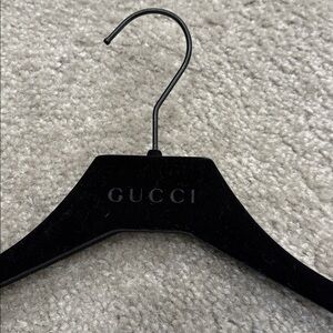 Gucci Sleek Black Clothing Hanger